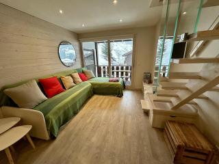 Duplex skis aux pieds centre village - 6 couchages - 2 salles de bain - 1