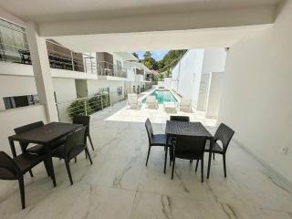 Apto Térreo com 2 quartos (ambos com ar split), sendo 1 suíte, internet privativa 300MBPS, no Residencial Vila Regina, condominio com piscina e área gourmet bem próximo a praia de Taperapuã - 4