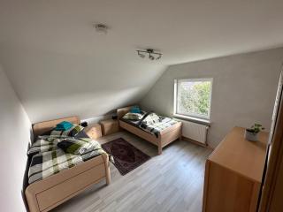 Ferienwohnung mit Balkon DG - 8