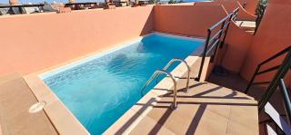 Homes of Spain, Apartamentos Paraiso Vera Playa, Ed Tahiti, Atico H de 2 dormitorios con piscina privada en solárium y barbacoa, pie de playa, WIFI - Playas de Vera - 4