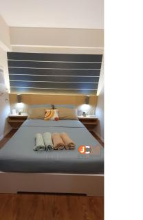 JC SpaceRentals 127B Amani Grand Resort Residences, balcony pool view, Ground floor, 5 mins frm airport, free wifi, Netflix - Pusok - 5