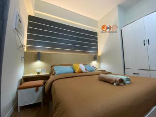 JC SpaceRentals 127B Amani Grand Resort Residences, balcony pool view, Ground floor, 5 mins frm airport, free wifi, Netflix - Pusok - 1