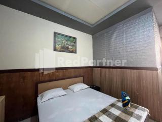 Hotel Dewi near GOR Merdeka Jombang Mitra RedDoorz - Jombang - 9