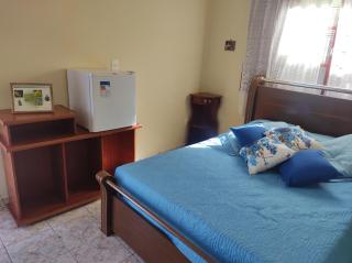 QUARTO CONFORTAVEL COM GARAGEM - Holambra - 2