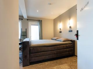 Luxe kamer met jacuzzi bij B&B Gezond aan Zee - Toegang Wellnesstuin meerprijs - Ouddorp - 9