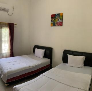 Hotel Nascar Famili - Palangkaraya - 7