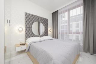 Luxurious Grey Apartment with Sauna, Gym and Parking by Noclegi Renters - Varsavia - 9