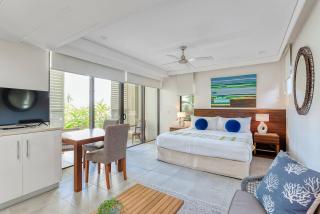 Poolside at Temple Resort - A Lush Tropical Escape - Port Douglas - 7