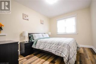 Cozy 3 Bedroom Downtown Cottage with Complimentary Breakfast Delivered Daily to the Rental - Cataratas do Niágara - 1