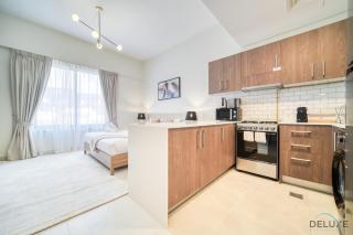 Stylish Studio Apartment at Casa Grande, JVC by Deluxe Holiday Homes - Dubai - 4
