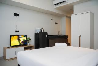 Studio Apartment with Sofa at Carstensz Residence By Travelio - 3