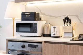 Stylish 1BR Retreat in Laya Heights, Studio City - 4