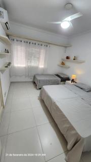Apartamento pé na areia Guarujá 3 quartos 3 banheiros sala cozinha equipada - 4