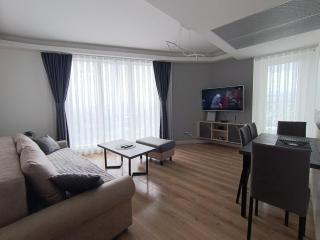 19th Floor Secure Condo with Pool, Fitness, Parking Included in Price - Skopje - 5