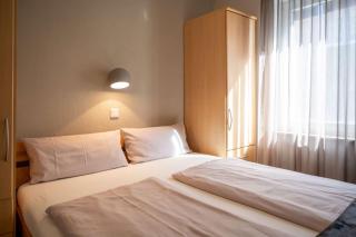 Antares Spiekerooger Gästehaus-Sonnengartenterrasse Süd - Wohnung 3 - 2