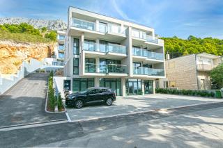 Seaside apartments with a swimming pool Brela, Makarska - 19834 - Brela - 0