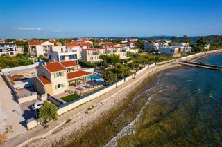 Beach front villa with heated pool, jacuzzi, fantastic view, the sound of the waves - by Traveler tourist agency Krk ID 2404 - Privlaka - 1