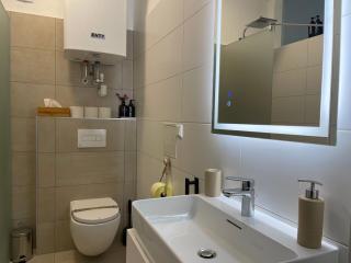 TAMLiving Graz Zentrum Balkon Küche Smart TV Ausblick - 3