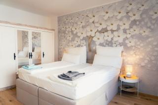 TAMLiving Graz Zentrum Balkon Küche Smart TV Ausblick - 5