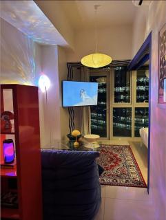 Bold & Cozy 1-Br in Uptown Parksuites BGC with Fast WiFi - Manila - 9