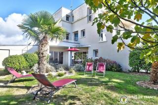 LocaLise - A80 - La villa blanche - Côté jardin - Plain-pied - Wifi inclus - Draps inclus - Animaux bienvenue - Le Guilvinec - 8