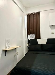 Private room with AC and fan at EKG MANILA House Rental - Manila - 4