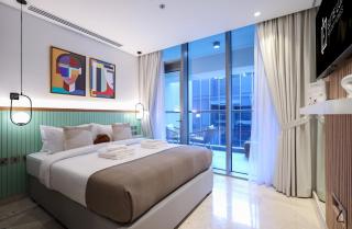 Elite LUX Holiday Homes - Elegant 2BR Suite in Business Bay Dubai - Dubai - 1