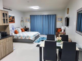 Stay at VERDANT by Camella Manors Deluxe King Bed with Balcony, Swimming Pool & Gym - 0