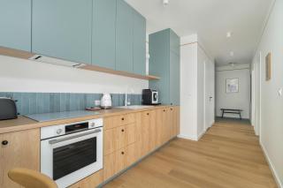 Unique 2-Bedroom Apartment on the 10th Floor with FREE GARAGE Poznań by Noclegi Renters - Poznan - 1