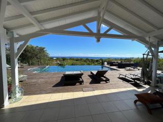 Villa Deluxe l'Hacienda Villa vue mer 180 piscine jacuzzi proche plage marina golf pointe des châteaux et casino jardin clos voyage durable - 8