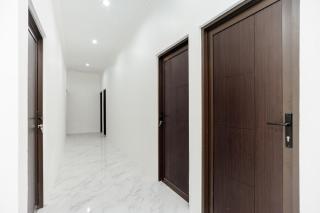 RedDoorz Syariah @ Sakura Hotel Jatiwaringin - 6