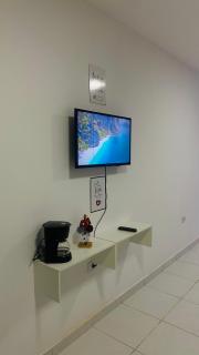 Apartamento kit net pé na areia - Praia Grande - 2