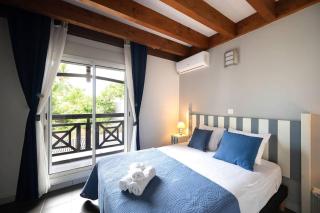 COTTAGE BAMBOU classé 3 étoiles - 4 à 6 personnes - 2 chambres - avec piscine privée et accès direct à la plage et à l'esplanade de Boucan Canot avec ses bars et restaurants - 6