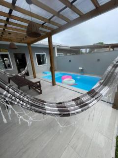 Casa com piscina ACONCHEGO no balneário de Shangri-lá - Pontal do Paraná - 3