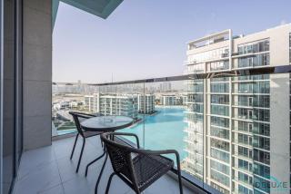 Lush 2BR apartment in District One Phase III, MBR City by Deluxe Holiday Homes - Dubai - 9
