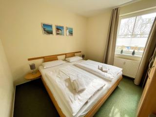 nur 100 m bis zum Strand, zentrumsnahe Ferienwohnung - Villa Meernixe FeWo 10 - 1