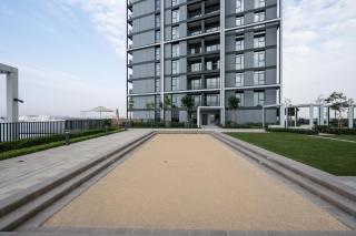 Cozy 1BR in Creek Edge Stunning Bay View Swimming Pool - Dubái - 1