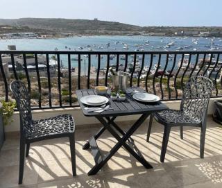 Seafront Penthouse w view MelliehaBay 1BED Minutes Walk to the Beach By Homely - Mellieħa - 0