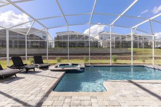 Refreshing 6 Bed Pool Home with Game Room Pool Spa condo - Davenport - 0