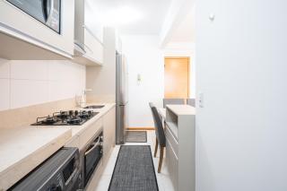 Apto em Barra Velha 340m da PRAIA com SACADA com CHURRASQUEIRA, AR CONDICIONADO WI-FI, PISCINA, PORTARIA 24h, ACADEMIA MINI MERCADO e vaga de GARAGEM - 6