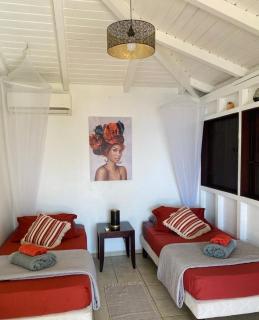 Villa Palma avec vue mer et piscine privée location Domaine de la Pointe Batterie à Deshaies - 2