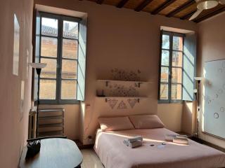 Minimal Studio con travi a vista - Piacenza - 3