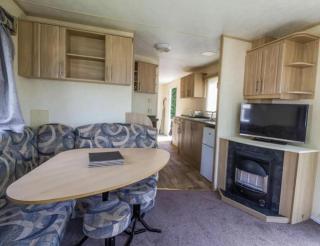CaravanSleeps8-FirePlace-PetsOk-Golf-Gym-Pool - Skegness - 0