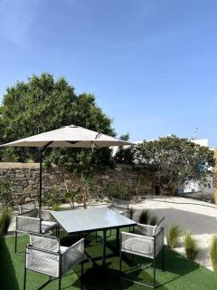 Minimal Grey Apartment Pool-front in Paros - 1