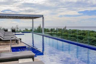 Happy Vibes Getaway with Stellar Oceanview Roof Pool! - Playa del Carmen - 5