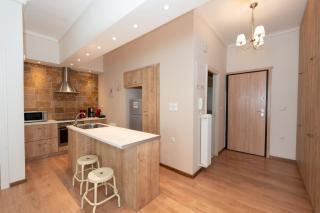Contemporary apartment made of wood and stone. - 9