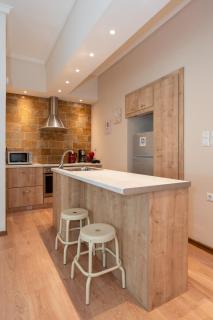 Contemporary apartment made of wood and stone. - 3