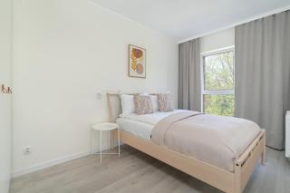 Family Apartment in Poznań with 2 Parking Spaces, 3 Bedrooms and Balcony by Noclegi Renters - Poznań - 9