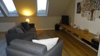 Gemütliches Dachgeschoss-Apartement mit Seeblick und großem Garten am Wasser - 9