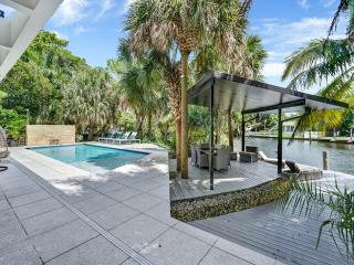 Experience Warmth & Comfort in our Stylish Balinese Waterfront Home - 4